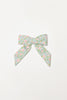 TEACUP PARTY BOW ALLIGATOR CLIP